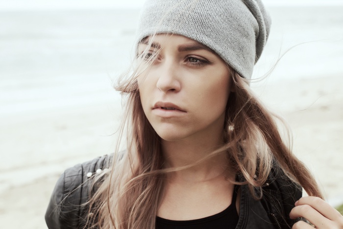 woman with grey cap