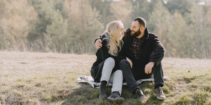positive couple in the wheat field