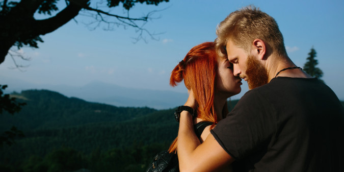 couple hugging on the hill